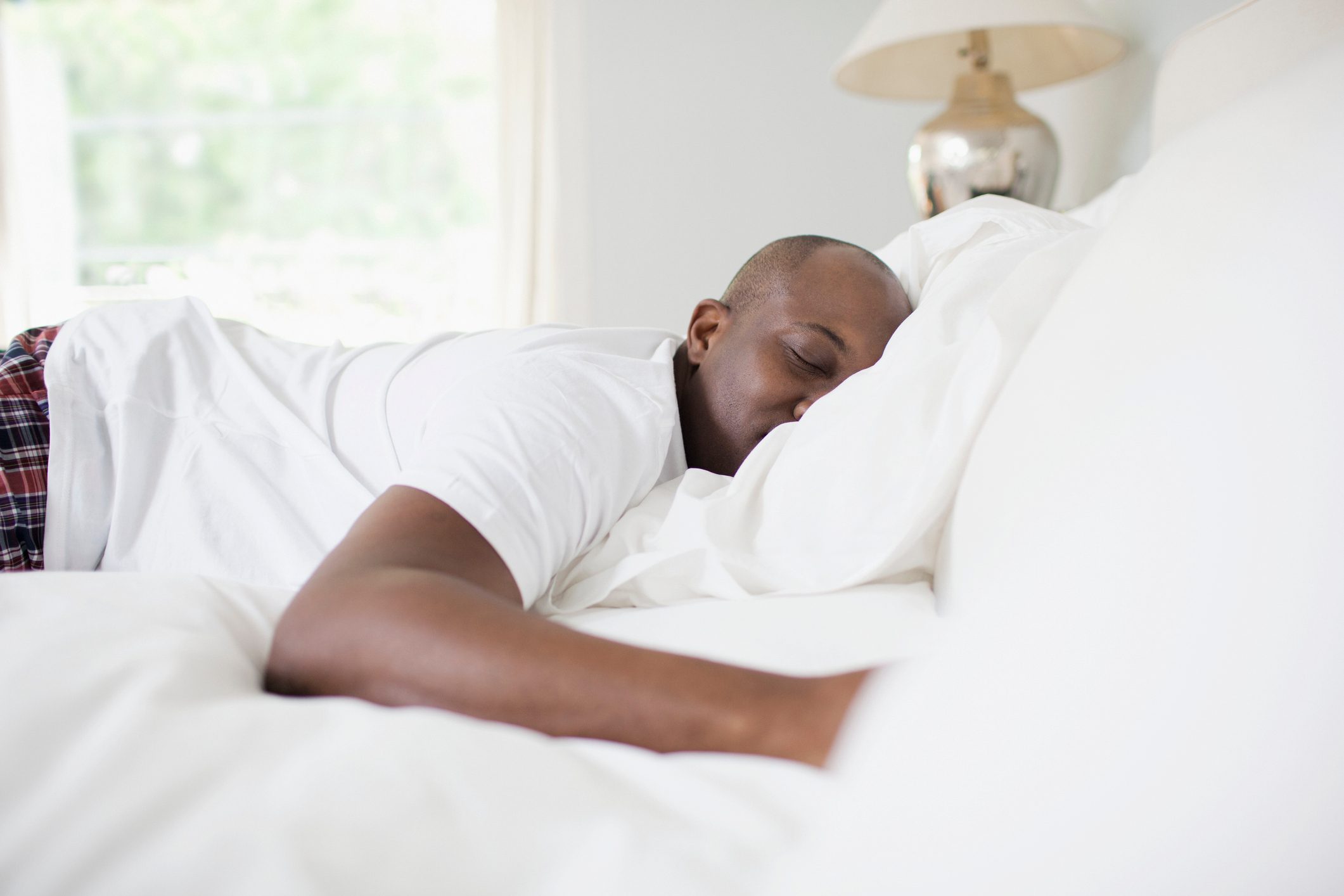 man sleeping in on the weekend
