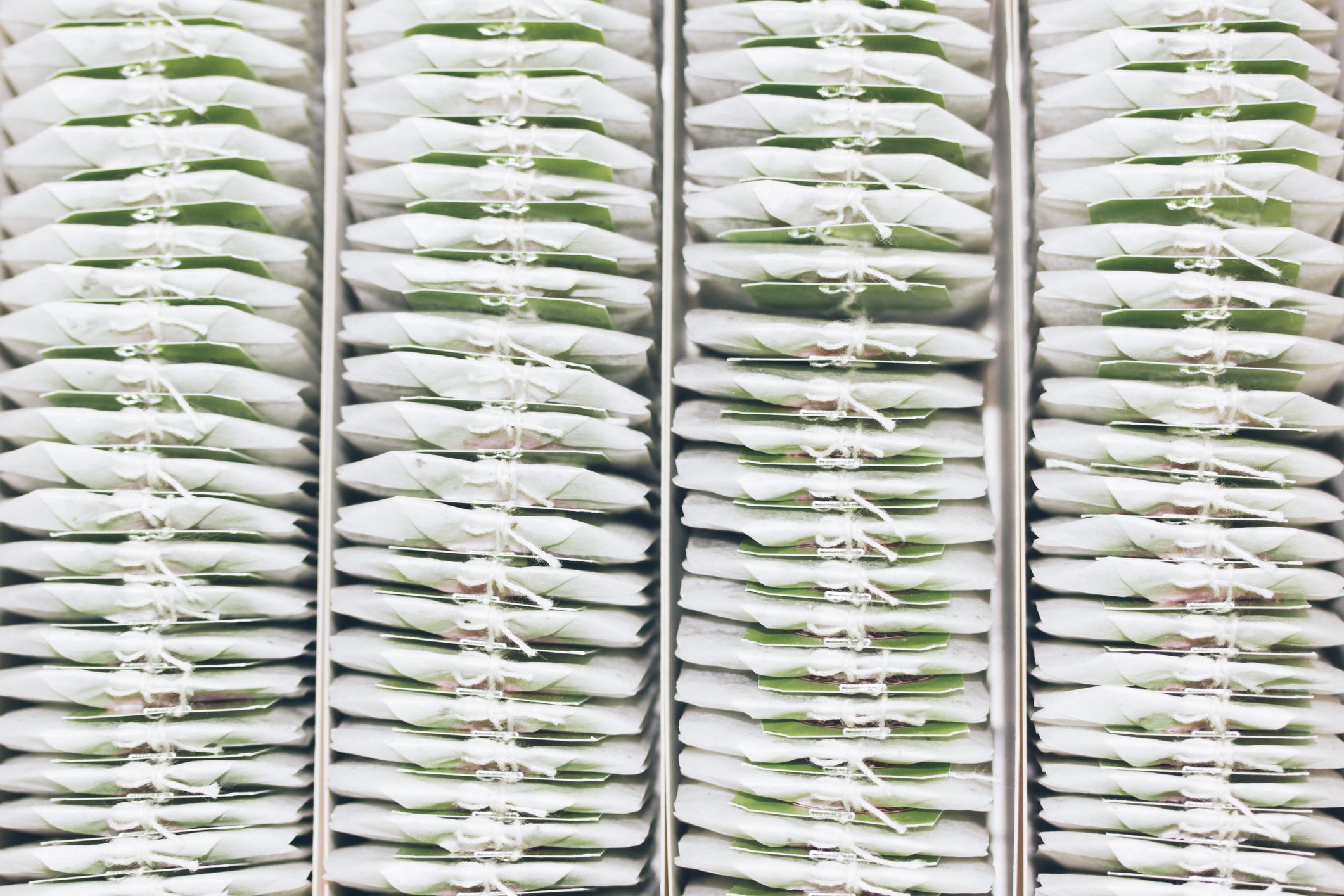Close-up of teabags in a box from above