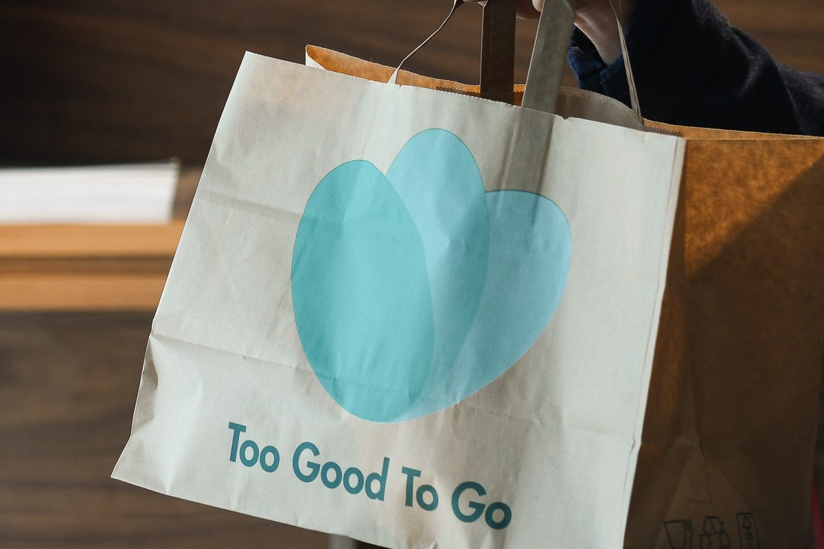 paper bag with too good to go logo