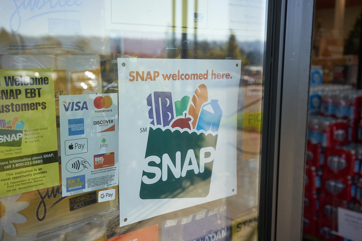 "SNAP welcomed here" sign at store entrance