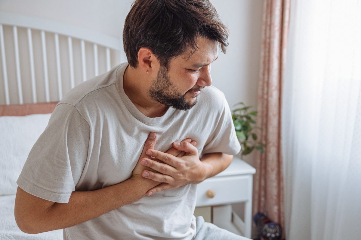 man having chest pain